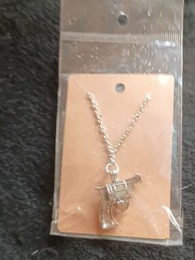 Silver Revolver Pendant Necklace - Gun Charm With A Glow In The Dark Ball Inside